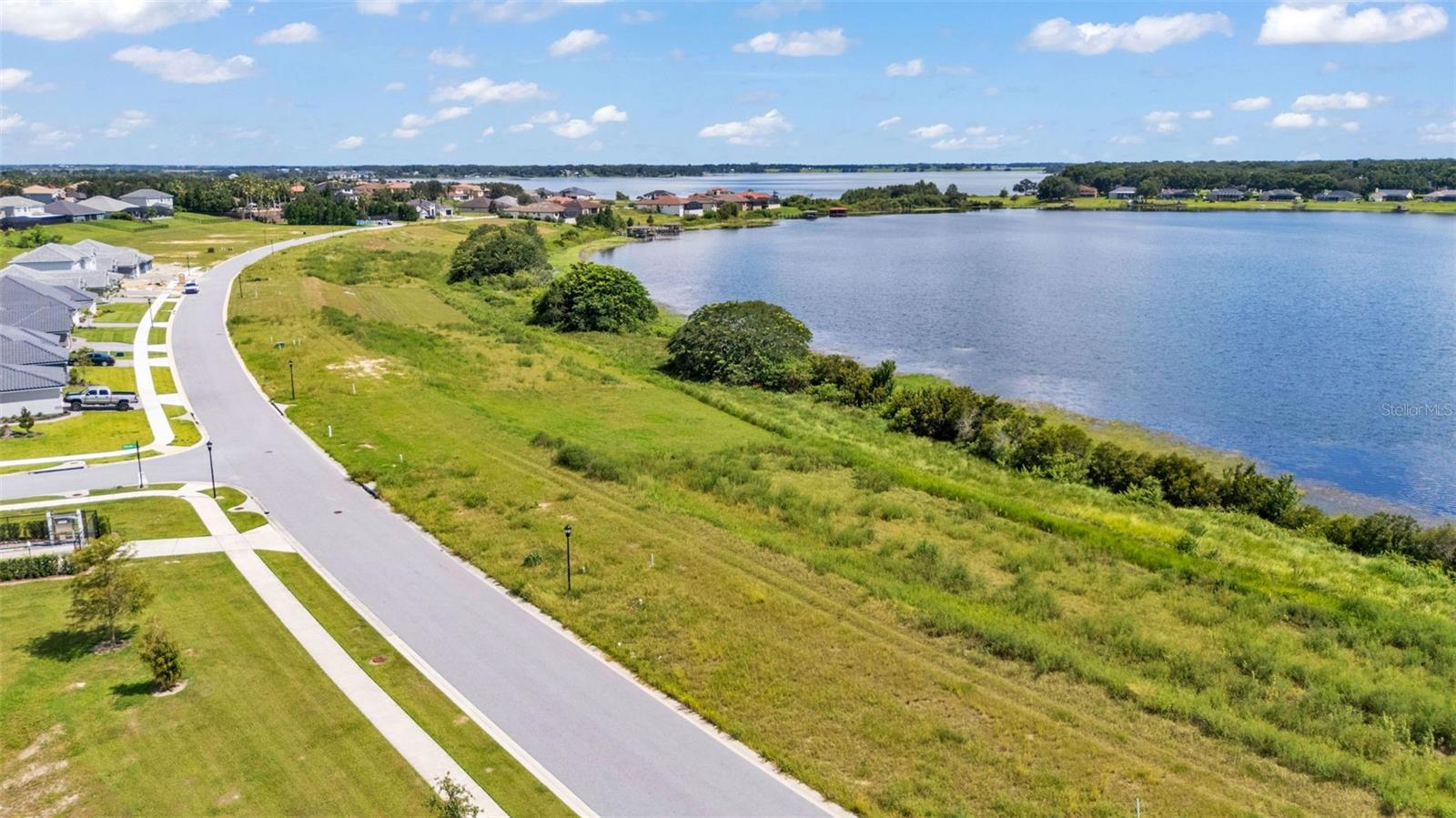 **Beautiful Lakefront Lot in Gated Lake Juliana Estates!**
click video link for community tour
This exceptional property offers **100 feet of true waterfront on Lake Tennessee**, providing the perfect setting to build your dream home. The lot has already been cleared all the way to the shoreline, giving you unobstructed views of the **108-acre public lake**—ideal for boating, water skiing, fishing, and more.
Lake Juliana Estates is an **upscale, gated community** featuring **resort-style amenities**, including:
* Fitness center
* Tennis courts
* Pickleball courts
* Clubhouse
* Community boat ramp with access to Lake Juliana
Conveniently located near **I-4**, this property offers an easy commute to both Orlando and Tampa while letting you enjoy peaceful lakefront living. This Community is in zone for A rated schools and is walking distance from shopping and restaurants.
---