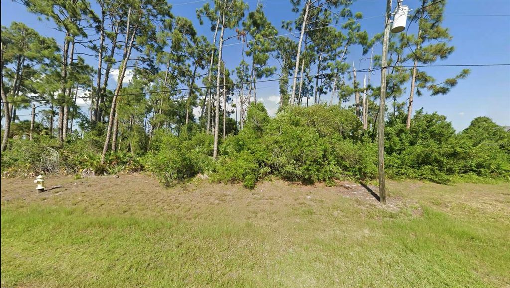 Photo of 127 Hobo Road, Rotonda West, FL 33947 (MLS # OM718994)