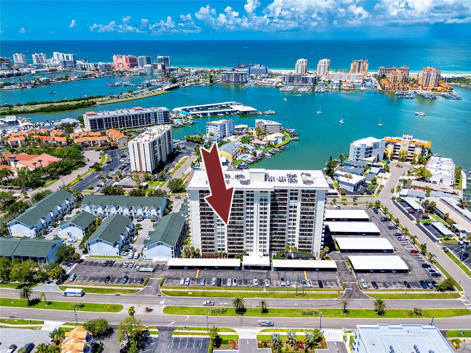 Available for rent September 2025 until the end of February 2026, with minimum rental period of 3 months. This 8th floor TURNKEY and fully furnished condo at Clipper Cove on Island Estates offers water views from every room! Just bring your personal belongings and start enjoying beach life DAY ONE! Only minutes from Clearwater Beach this beautiful condo, facing East, has an unobstructed water view of an intercoastal waterway which can be enjoyed from a private balcony. The condo features a primary bedroom with queen size bed, ensuite bathroom & a large walk-in closet. Second bedroom contains two twin beds with plenty of storage space. The unit has an open floor plan with updated kitchen, breakfast bar seating, wine bar, pantry and granite countertops, lots of cabinets and indoor laundry in the hallway bathroom. Clipper Cove offers resort lifestyle with a huge pool, hot tub, BBQ area, tiki huts, exercise room, fishing dock and a clubhouse. Located just a short distance from Publix shopping center, dining, etc, you don't have to drive far to take care of your shopping needs. Enjoy the tourist attractions such as Clearwater Aquarium and Marina nearby as well as Clearwater Beach, including boat rides, sunset events at Pier 60, restaurants, gift shops, not to mention world famous pristine sands at the beach. Don't wait and schedule your showing today!