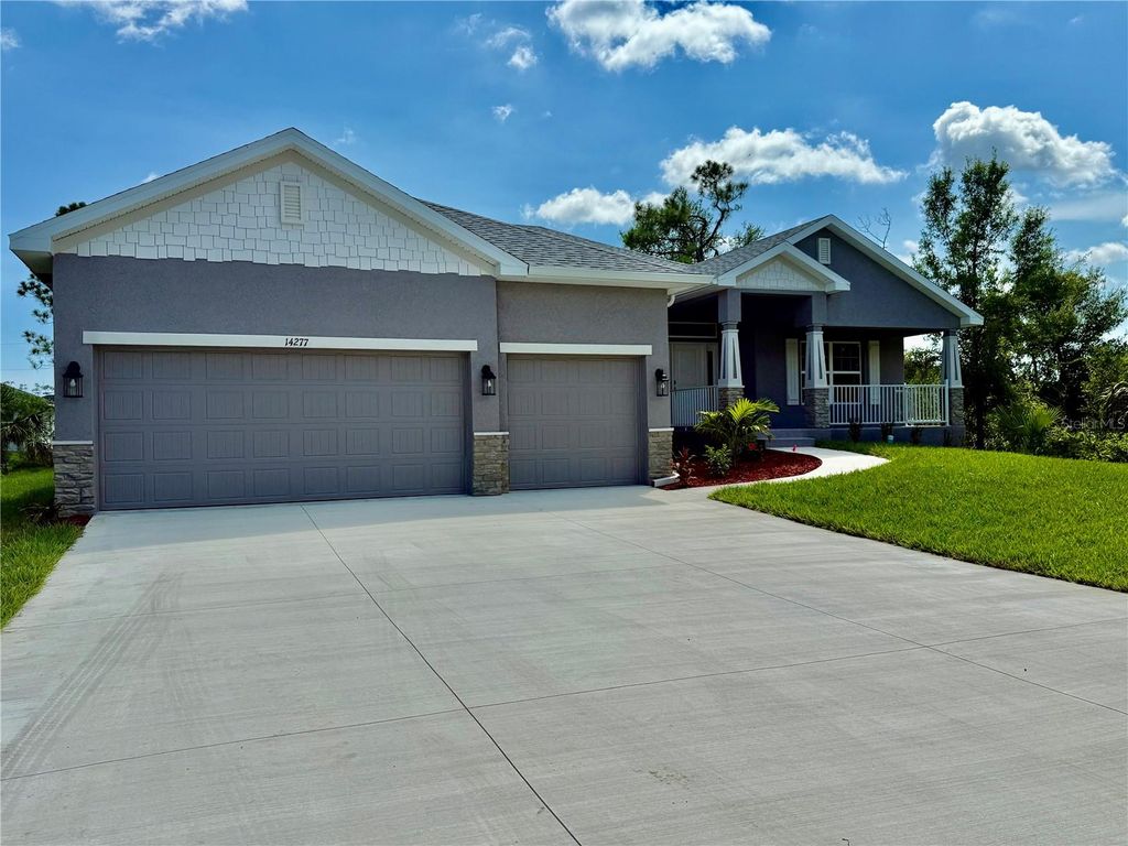 Photo of 14277 Sanilac Avenue, Port Charlotte, FL 33981 (MLS # C7511221)