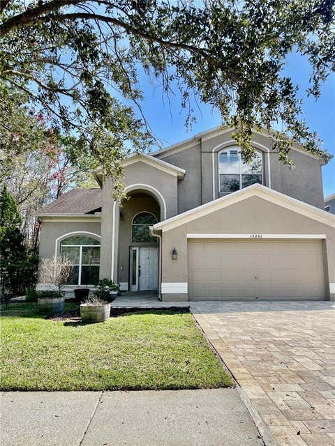 Photo of 13261 Royal George Avenue, Odessa, FL 33556 (MLS # TB8538497)