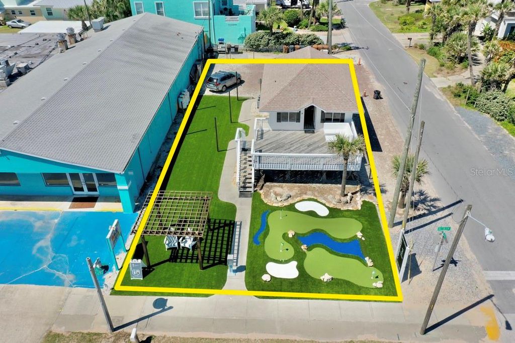 Photo of 511 N Ocean Shore Boulevard, Flagler Beach, FL 32136 (MLS # FC314462)