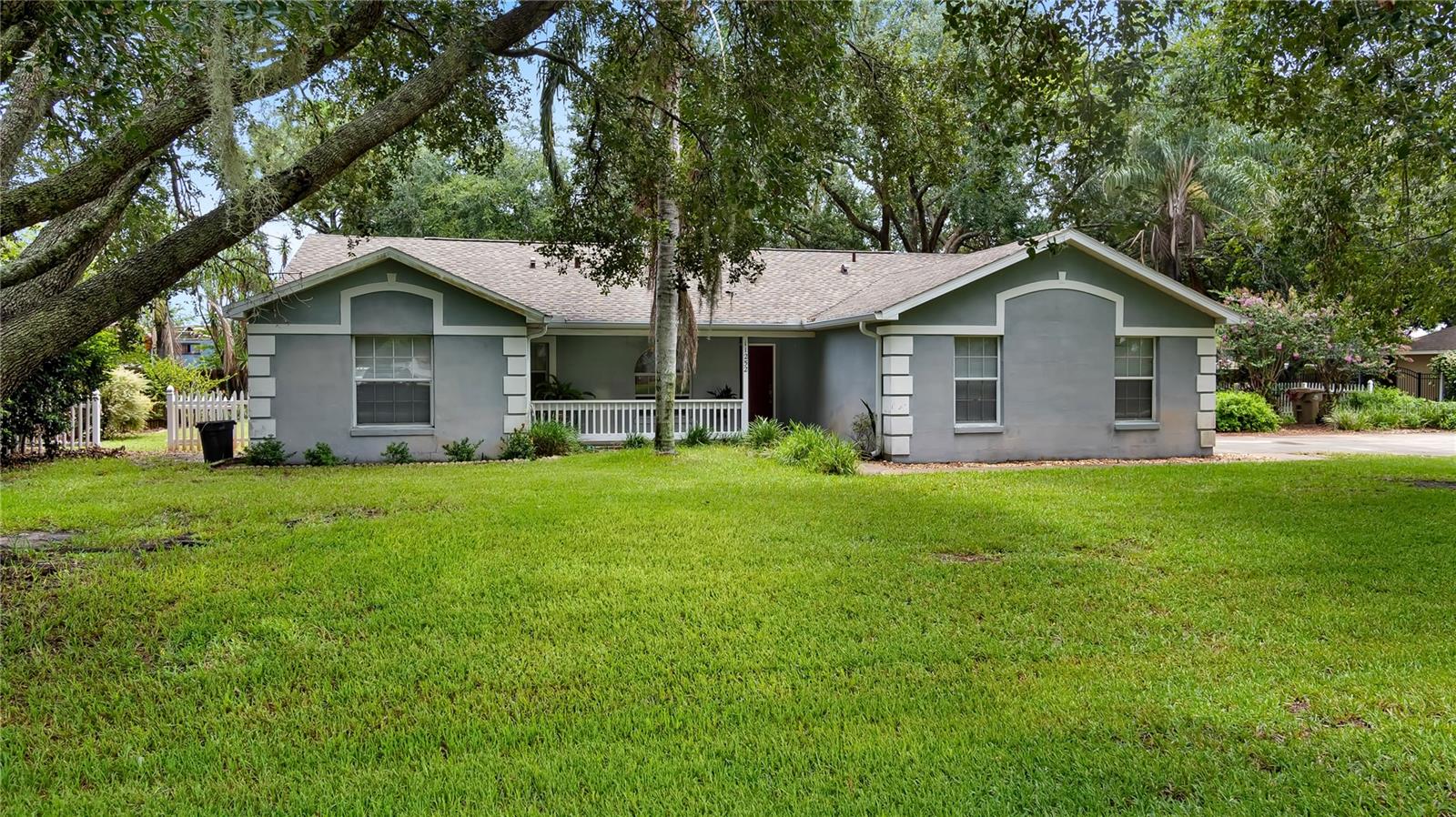 RARE custom built 3/2 HOME in Clermont on 1/2 Acre and NO HOA! Spacious primary suite split from 2 guest rooms plus a living room and family room makes for a great space for all. Check out a video walk through now via this link https://vimeo.com/1098015156 The amazing trees give great shade from the Florida sun and the side garage keeps that loved curb appeal. NEW ROOF in 2022 makes it even more appealing. All located on the quiet country side of Clermont just off lakeshore Dr. BRING THE BOAT & RV - Huge fenced in back yard to park them all and still space for activities or to even add that pool you’ve always wanted. Far enough away from the hustle n bustle but close enough to town for all your needs. Historic downtown Clermont has many shops, restaurants, farmers Market, Waterfront Park, Splash pad, Walking trials & multiple boat ramps. Orlando’s amenities, MCO and Walt Disney World are 40mins away while World Famous Beaches on either of Florida’s coast lines are just 90mins away. This well maintained home is price to sell and is excited to meet its new owner so book your showing today.