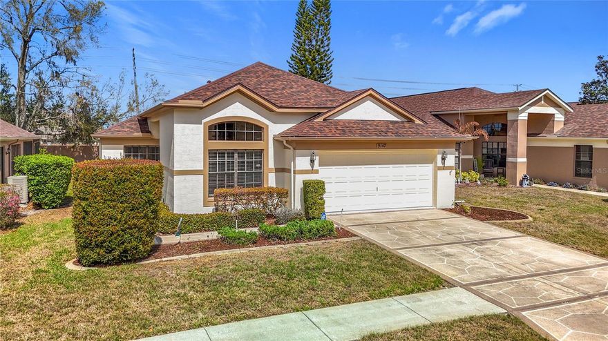 Welcome to a rare opportunity in beautiful Hudson — first time on the market in years and ready to impress.

Step inside this completely remodeled home (2022) where modern upgrades meet refined taste. From the moment you enter, you’ll notice the bright, open floor plan enhanced by soaring ceilings and gorgeous engineered hardwood flooring that flows throughout the living spaces. Every window is finished with new high-end wood blinds, adding both elegance and privacy.

The kitchen is truly the heart of the home and will likely be the highlight for many. Designed for both entertaining and everyday living, it features custom soft-close cabinetry, beautiful modern appliances, and luxurious quartz countertops. A spacious center island with seating for four makes it the perfect gathering place for family and guests — whether you’re hosting dinner parties or enjoying a quiet morning coffee.

The open layout connects the kitchen and living area seamlessly, creating a welcoming space that feels both expansive and comfortable.

Outside the home, the lifestyle continues. Tucked on a quiet, well-maintained street of similar homes, you’ll enjoy the perfect balance of peaceful neighborhood living while being just minutes from shopping and local dining. Even better, the community pool and clubhouse are within walking distance, giving you resort-style amenities without the upkeep.

Additional highlights include:

Spacious two-car garage with room for vehicles, storage, or weekend toys

HOA amenities that simplify Florida living, including lawn maintenance

Beautifully maintained neighborhood with convenient access to everyday essentials

Please schedule a private showing by appointment with our Realtor.

Homes with this level of thoughtful remodeling and attention to detail rarely come available — and once you see it, you’ll understand why.

Don’t miss your chance to make this exceptional home yours.