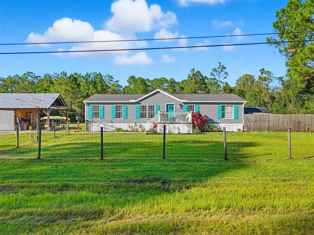Photo of 4856 Pecan Avenue, Bunnell, FL 32110 (MLS # FC313669)