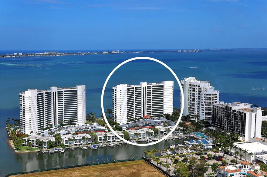 For LEASE. $5,000 per month on an annual basis (12 mos) and $7,000 per month for 6 months. Direct Bayfront Living with fabulous views of Sarasota Bay and the Gulf of Mexico.  Enjoy stunning water views and breathtaking sunsets from this charming bayfront residence, nestled in a quiet and peaceful section of downtown Sarasota. This bright and open 2-bedroom, 2-bath unit features a thoughtfully designed floor plan with large sliding glass doors that open to a private balcony, perfect for alfresco dining while soaking in the best views Sarasota has to offer. The spacious kitchen is equipped with newer stainless steel appliances, granite countertop, breakfast bar. The primary suite offers a large walk-in closet and a touch of elegance with its double French door entry. Additional updates include a new A/C and tankless water heater (2019), and complete re-piping of the unit in 2023. One assigned under-building parking space is included, along with additional open parking for guests. Condo on the Bay amenities include two resort-style pools, tennis and pickleball courts, a fitness center with sauna and diverse equipment, 24/7 staffed security, concierge service, boat docks and kayak facilities. Adjacent to the Van Wezel, the bayfront park, the new Ocean Prime restaurant, and short drive to Lido Beach and St. Armands Circle.