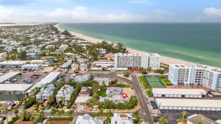 This exceptional turnkey 5-bedroom, 5-bath duplex on Anna Maria Island offers a rare investment opportunity just moments from the white-sand beaches of the Gulf of Mexico, as well as the island’s charming shops and top-rated dining. Comprised of two beautifully renovated cottages—a 3BR/3BA and a 2BR/2BA, all en-suite—this unique property is connected by a solid 8-inch concrete block wall for excellent sound insulation, with separate street entrances that provide privacy for guests. Fully renovated down to the bare block in 2009, both residences feature raised ceilings, travertine floors and showers, granite countertops, crown molding, updated plumbing and electrical, new windows and doors, and quality finishes throughout. The 3-bedroom cottage includes a stunning primary suite with a 10-foot lighted tray ceiling, while each cottage enjoys its own private heated pool, maximizing rental appeal. With strong established rental history, this income-producing island property is the perfect blend of luxury, privacy, and prime location.
