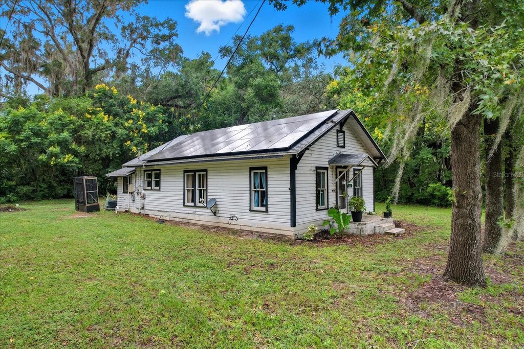 Photo of 11226 SE 55th Avenue Road, Belleview, FL 34420 (MLS # OM710870)