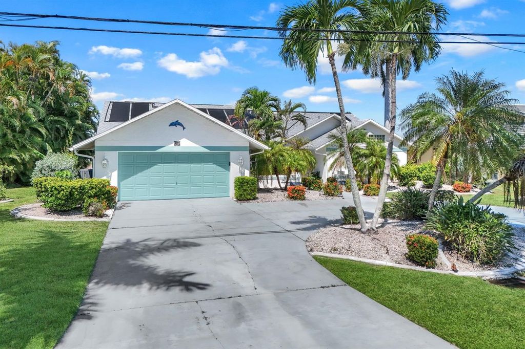 Photo of 719 El Dorado Parkway W, Cape Coral, FL 33914 (MLS # TB8508315)