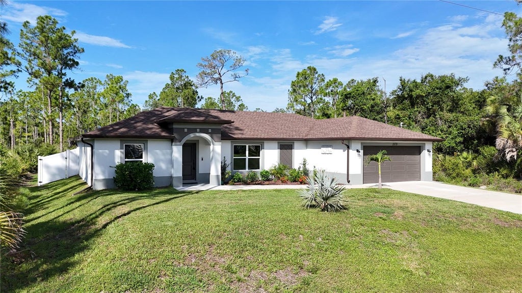 Photo of 1879 Squaw Lane, North Port, FL 34286 (MLS # C7528083)