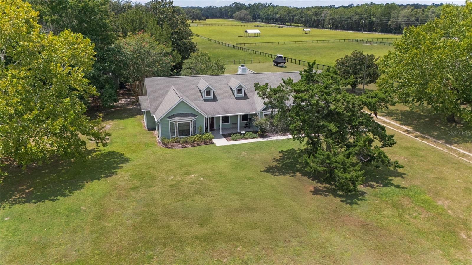 LISTED WELL BELOW APPRAISED VALUE. 1-Owner Home on 6.39 Acres – Minutes to WEC & Ocala Amenities
First time on the market! This well-maintained 1-owner home sits on 6.39 fully fenced acres with an electric gate, just minutes from the World Equestrian Center, I-75, shopping, hospitals, and everything Ocala has to offer.
Featuring over 2,500 square feet of living space, this home offers 4 bedrooms, 3 full bathrooms, including two master suites, and a bonus den; perfect for a home office or flex space. The spacious living room includes a wood-burning fireplace, ideal for cozy gatherings. Enjoy peaceful evenings on the covered back porch while taking in Florida’s beautiful sunsets.
With plenty of room to add a barn, this property is horse-friendly (A-1 Zoning) and offers the perfect balance of privacy and convenience.