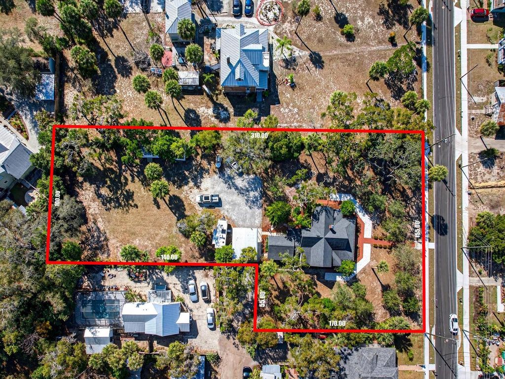 Photo of 210 N Grosse Avenue, Tarpon Springs, FL 34689 (MLS # TB8476759)