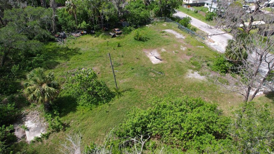 Prime Development Opportunity in the Heart of New Port Richey!
This cleared 0.63-acre parcel (28,022 SF) is ideally located near downtown, offering excellent potential for builders and investors. Zoned 00R3 (5.8 dwelling units per acre) with Future Land Use designated as High Density
Residential, the property presents a great opportunity for subdivision into up to three parcels or rezoning to R4 or Multifamily to maximize development options. Utilities nearby – water and electricity run along the property
line, and there is an existing septic system (location to be verified). Enjoy a convenient location with easy access to Robert K. Rees Memorial Beach Park to the West and Sims Park to the East, putting recreation, dining,
and entertainment within close reach. Don't miss your chance to shape the future of this centrally located property!