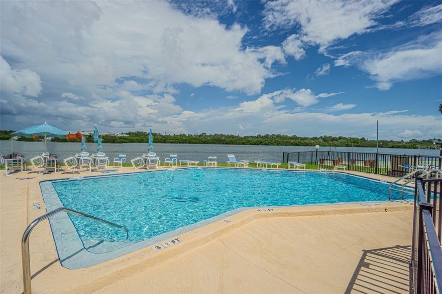 ** 2ND FLOOR UNIT! BEST priced unit in the community *** (2 BED 2 BATH)  This unit is a CASH COW! Buy as a desired vacation rental or second home! ALL ages welcomed! UNIT COMES FULLY FURNISHED and TURNKEY with linens, extra pull out bed, beach chairs, fishing pole and so much more. LAUNDRY INSIDE UNIT! ASSIGNED COVERED PARKING & STORAGE steps from the unit. (AC 2017) Welcome to your piece of paradise with a view, in the heart of Indian Rocks Beach less than half a mile from the beach! This this tastefully updated, well appointed and meticulously maintained two-bedroom, two-bathroom condo is nestled in a very unique community that offers the ideal coastal lifestyle. As you step inside, you'll be immediately struck by the abundance of natural light that fills the living space, accentuating the beautiful new laminate flooring throughout. Master bedroom is very spacious with a large walk in closet and en suite bathroom. 2nd Bedroom has dual closets. Large enclosed Bonus Florida Room with a storage closet off the back of the unit. This unique community offers an array of fantastic amenities, including a clubhouse, a refreshing waterfront pool, shuffleboard courts etc.  Picture yourself spending your leisure time by the poolside, savoring the Florida sunshine, and making new friends among your neighbors.  Unit comes fully furnished and ready to rent or move in, just bring your swimsuit! Everything currently in the unit will convey to the new owners.*** HOA FEE COVERS, Cable TV, Internet, Pest, sewer, trash, water, community pool, exterior maintenance, grounds maintenance and more, ensuring hassle-free living. This unit will not last! Great income producing unit!