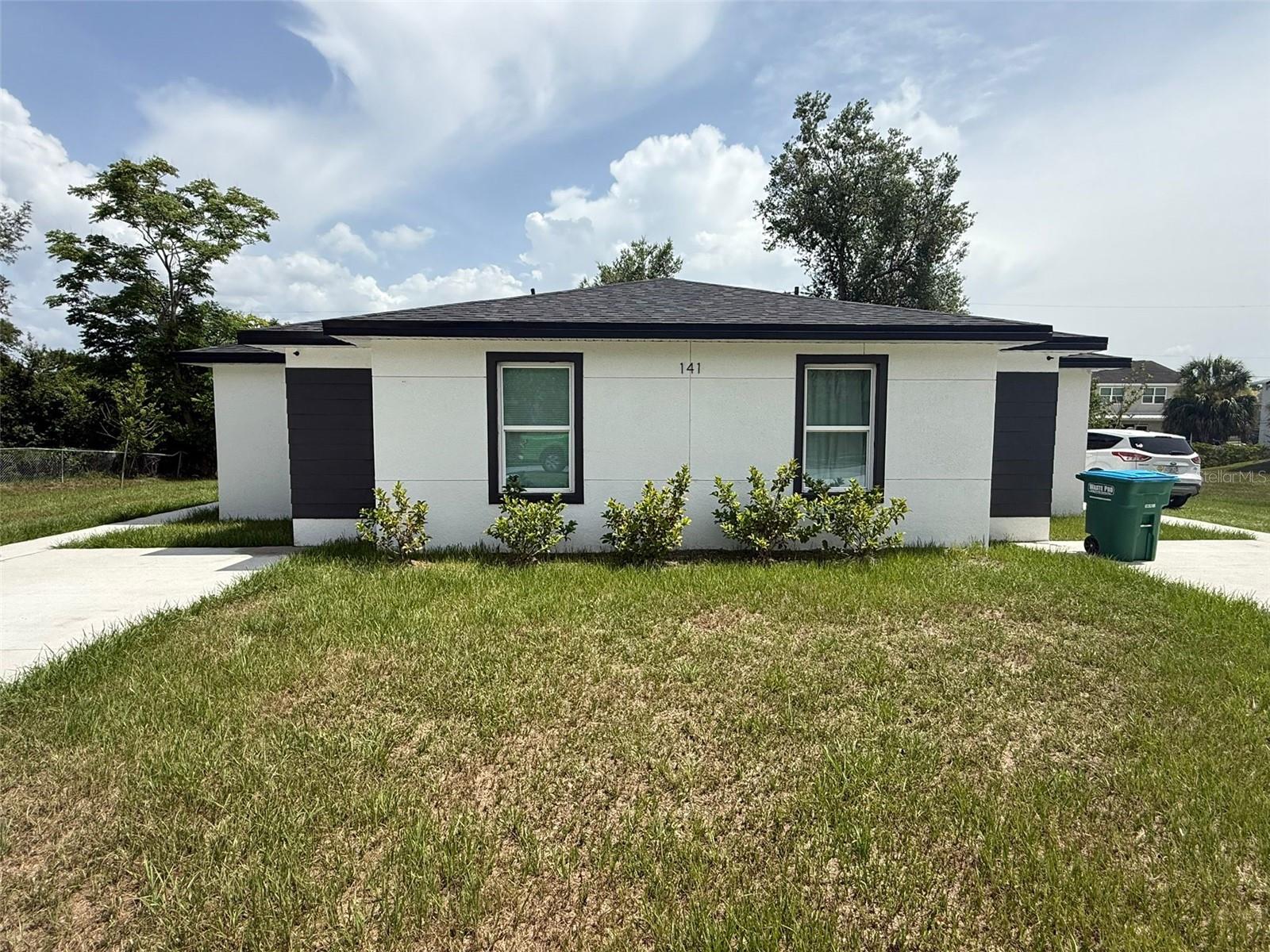 Modern and beautifully designed 1/2 duplex. 3 bedrooms and 2 bathrooms, a spacious open floor plan, a kitchen with granite countertops, waterproof laminate flooring throughout, and a generous living and dining area. The master bedroom includes a large walk-in closet. Located in a convenient area close to I-4, shopping centers, restaurants, just 30 minutes from the beach and 45 minutes to Orlando. Live in comfort and privacy