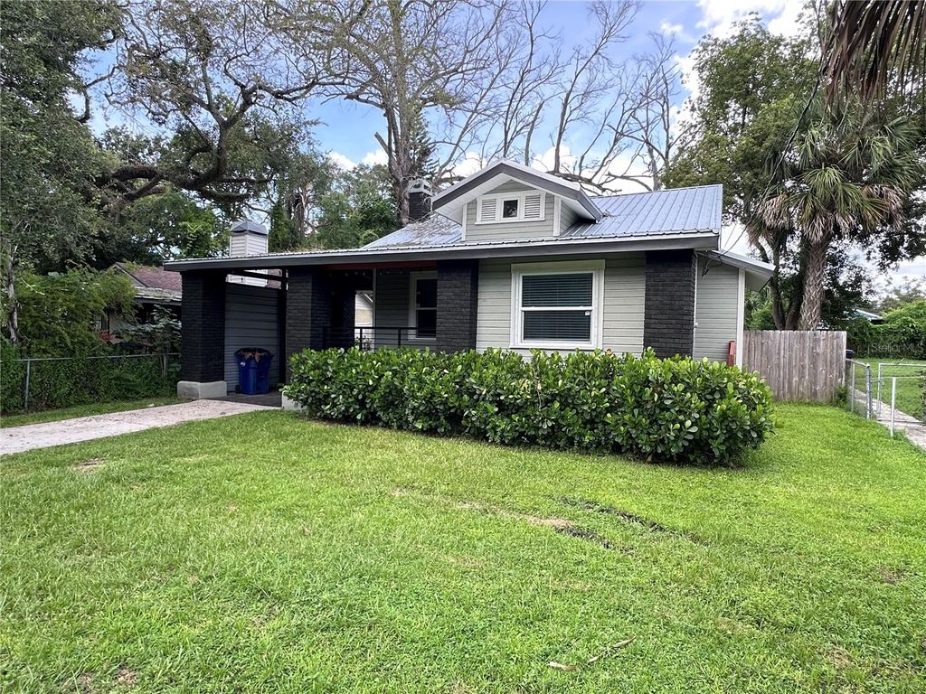 Photo of 209 W Louisiana Avenue, Tampa, FL 33603 (MLS # TB8413885)