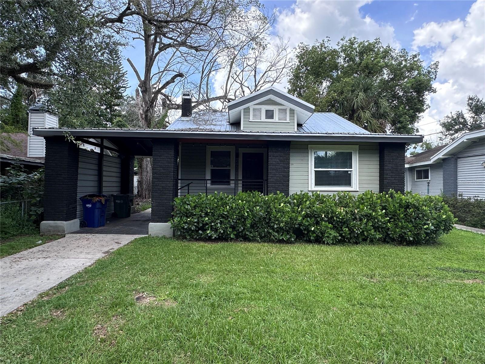 Short Sale. Unapproved Short Sale. This charming 3/2 Seminole Heights bungalow was built in 1924, and was remodeled just a few years ago. Newer roof, A/C, windows, doors, plumbing, electric, and flooring. The open floorplan features a wood burning fireplace in the living room, which flows seamlessly into the lovely kitchen with updated cabinets and a large island with beautiful quartz countertops. The master suite provides a lovely retreat with plenty of space and an updated bathroom. Outside you will find a detached garage and a fenced in back yard for privacy. The prime location puts you just minutes from everything that Tampa has to offer. Call today for your private showing!