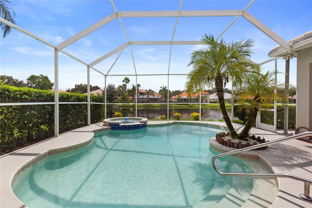 Photo of 10209 Waterside Oaks Drive, Tampa, FL 33647 (MLS # TB8428614)