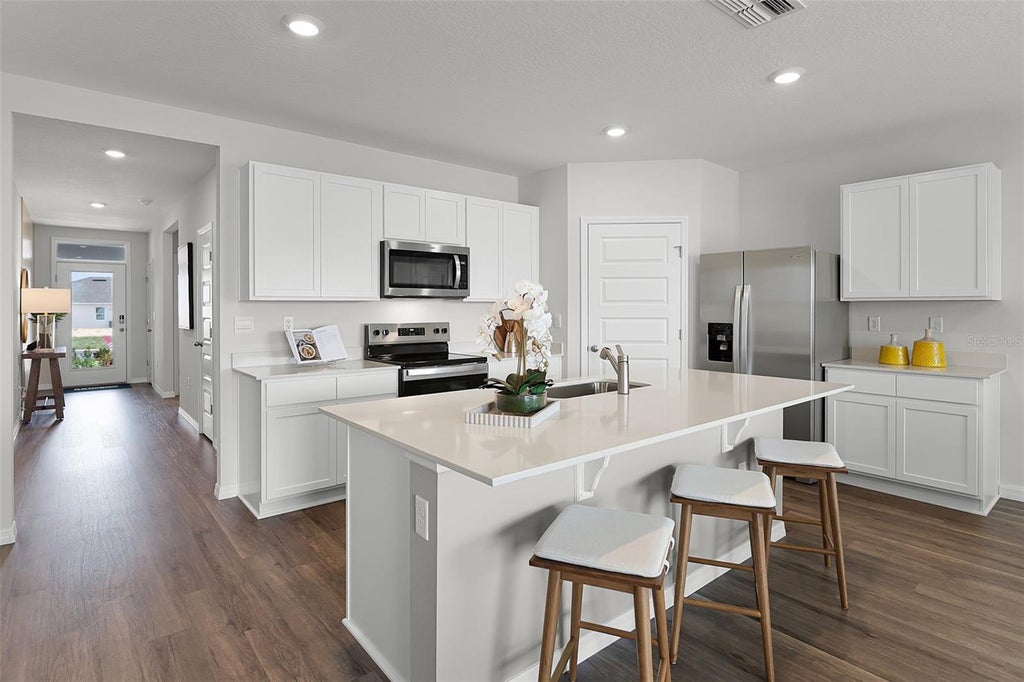 Photo of 2490 Aveeno Avenue, Haines City, FL 33844 (MLS # O6437965)
