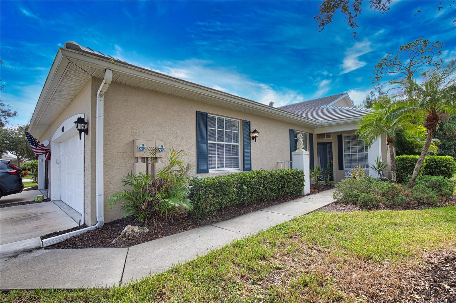 Motivated seller! Welcome to this beautifully maintained 2-bedroom, 2-bath villa with den (optional 3rd bedroom) in the highly desired St. Andrews Park of Plantation Golf & Country Club. Perfectly located on a quiet cul-de-sac, this spacious home offers serene surroundings and convenient access to the community pool directly across the street. Enjoy tranquil views of your own tropical garden and the 13th hole of the Bobcat Course, providing a peaceful and private retreat. The open floor plan features cathedral ceilings, an extended living room, split bedrooms, and a versatile bonus area off the kitchen for storage or hobbies. The large primary suite includes dual closets, southern exposure, and an en-suite bath with soaking tub, separate shower, and private commode. This partially furnished home is move-in ready with a new tile roof (2023), new water heater (2023), and AC (2018). The HOA covers exterior maintenance, roof care, lawn service, pest control, water/sewer, basic cable, and annual vent cleaning for true maintenance-free living. Enjoy multiple community pools, one just steps away, plus optional membership to Plantation Golf & Country Club offering golf, tennis, pickleball, bocce, fitness, dining, and social activities. Conveniently located near Center Road, just minutes from Wellen Park, Downtown Venice, shopping, dining, beaches, and Sarasota Memorial Hospital. Experience the best of relaxed Florida living in this inviting Venice villa!