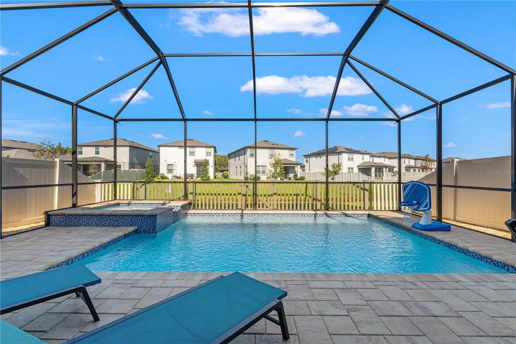 Photo of 7496 Yale Harbor Drive, Wesley Chapel, FL 33545 (MLS # TB8437981)