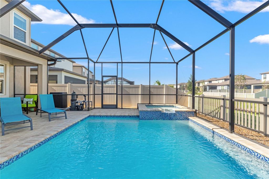 Photo of 7496 Yale Harbor Drive, Wesley Chapel, FL 33545 (MLS # TB8437981)