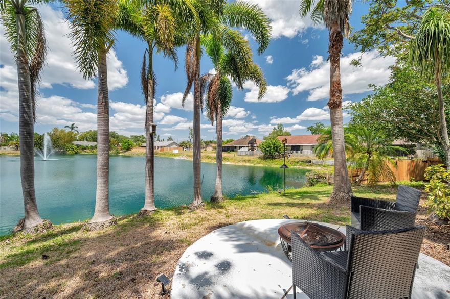 Beautifully remodeled 2-bedroom, 2-bathroom home with a 2-car garage PLUS A RARE 3RD BAY, this home offers an INCREDIBLE LAKE VIEW and a spacious, thoughtfully designed interior. From the moment you arrive, you’ll feel like you’ve discovered a HIDDEN OASIS—peaceful and private, yet conveniently located near everything Sarasota has to offer. The home features a NEW KITCHEN with NEW CABINETS and NEW QUARTZ COUNTERTOPS, a RENOVATED PRIMARY BEDROOM, and ALL-NEW FLOORING throughout the main living areas and bedrooms. Vaulted ceilings and an open layout with a LARGE KITCHEN ISLAND enhance the bright, airy feel. The living spaces are FRESHLY PAINTED in neutral tones, and the PRIMARY BATHROOM has been fully updated with a WALK-IN SHOWER, TOILET, and VANITY. Additional major upgrades include a NEW AIR HANDLER (2022), WATER HEATER (2024), ROOF (2023), and NEW INTERIOR DOORS. The LARGE SCREENED PATIO OVERLOOKING THE LAKE is perfect for enjoying true FLORIDA LIVING, surrounded by PALMS, MATURE LANDSCAPING, and a COOLING LAKE BREEZE. Ideally located just 6 miles from both downtown Bradenton and Sarasota, 8 miles from Lido Beach and St. Armands Circle, and only 5 miles from UTC—this home offers unmatched convenience while still feeling like a peaceful retreat.