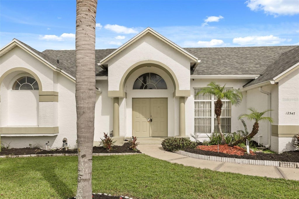 Photo of 12547 W Hope Drive, Orlando, FL 32837 (MLS # O6447883)