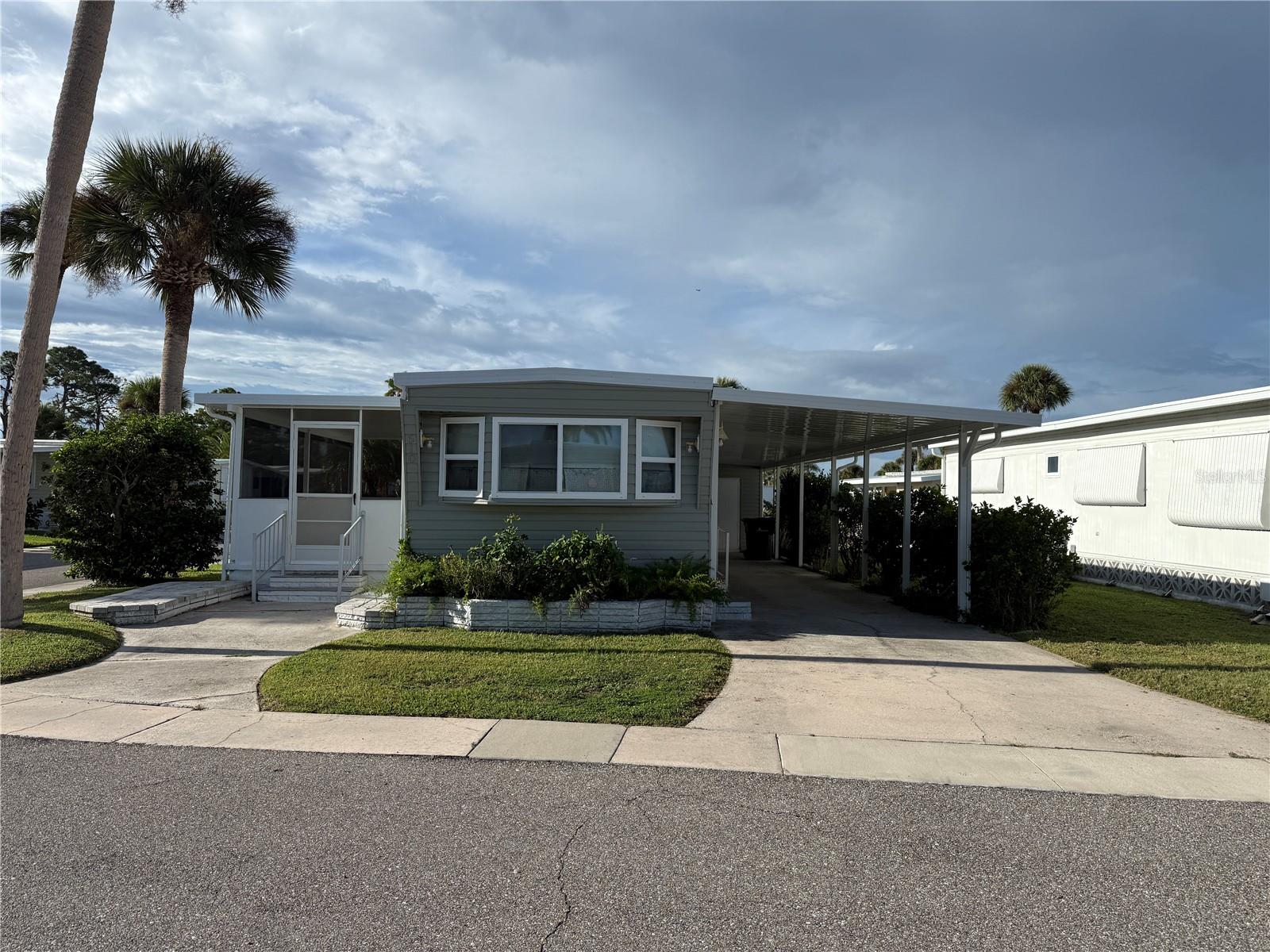 You don't want to miss this great opportunity to own in Japanese Gardens for a great price! This two bedroom, 1 bathroom home is located on a corner lot on a quiet street. The home has a new carport and screened room. Japanese Gardens is an active 55+ community located about 1 mile from Manasota Beach and close to downtown Venice, Englewood, and Wellen Park! The community features many amenities such as pickleball, shuffleboard, and bocce courts, a beautiful pool and hot tub, a library, a billiards room, and a large clubhouse where many activities take place. There is always something happening in Japanese Gardens!