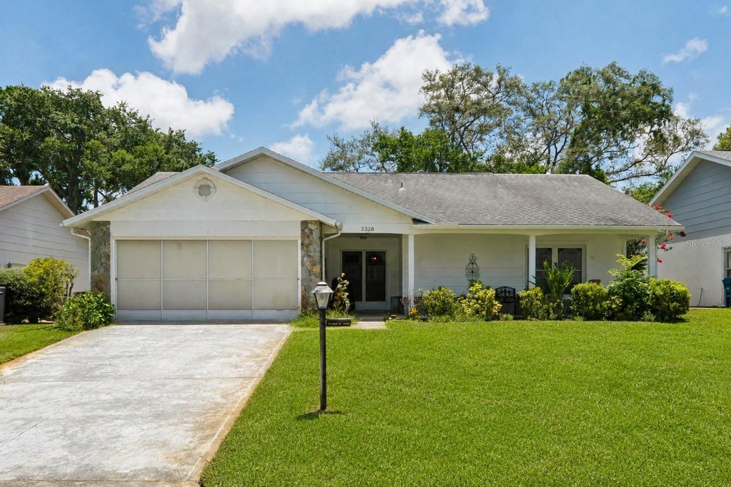 Photo of 2328 Palm Springs Court, Spring Hill, FL 34606 (MLS # W7888450)