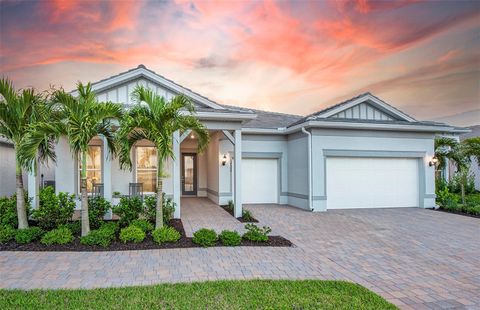 Photo of 26505 Sandy Hill Drive, Englewood, FL 34223 (MLS # TB8458355)