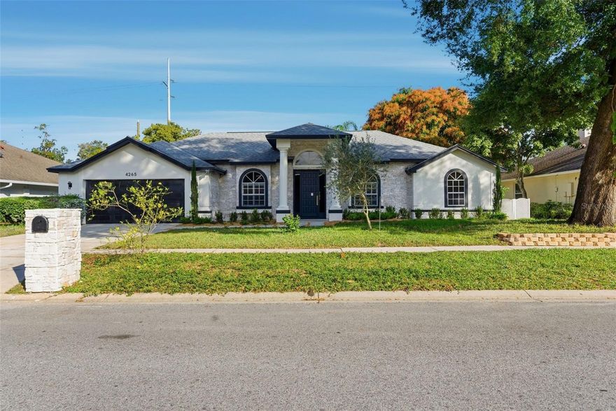 Set inside Conway Place, one of Orlando’s most desired lake-lifestyle neighborhoods, this renovated 5-bedroom, 3-bath, nearly 3,000 sq ft residence offers a rare combination of design, space, and private access to the Conway Chain of Lakes—a lifestyle that simply isn’t available in most of the city.

The home has been thoughtfully renovated with intention, delivering a clean, elevated aesthetic with a subtle modern Italian influence-warm, refined, and unmistakably custom. Recent improvements include new flooring, fresh interior and exterior paint, upgraded landscaping, concrete pavers, updated lighting and fan fixtures, and an outdoor setting designed for real living with a firepit and cabana. The home has an abundance of fruit trees such as, Venezuelan Mango tree, Papayas, Lemon tree, and Olive tree. 

The heart of the home is the stunning kitchen-finished with top-tier quartz, mini shaker cabinetry, and a dedicated coffee bar that feels like it belongs in a luxury build. It’s both visually striking and highly functional-built for entertaining, daily rhythm, and the kind of home life that feels effortless.

In the family room, a wood-burning fireplace becomes a true focal point, framed by an Italian porcelain backsplash wall that brings texture and character without trying too hard. This is the kind of detail you don’t see in cookie-cutter renovations-it’s curated.

The primary suite was designed to feel like its own retreat. Fresh Italian porcelain tile gives the space a distinct identity, and the primary bath continues the same material-forward approach with natural stone, varied cuts of porcelain, and a natural stone sink.

Set on a ¼-acre lot, the outdoor upgrades extend the living experience beyond the walls-perfect for hosting, unwinding, and enjoying the quiet charm that makes Conway Place so hard to get into. 

A one-of-a-kind opportunity in a neighborhood people wait for.