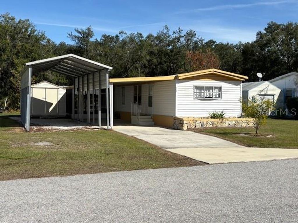 Photo of 76 Rosalie Oaks Boulevard, Lake Wales, FL 33898 (MLS # P4937619)