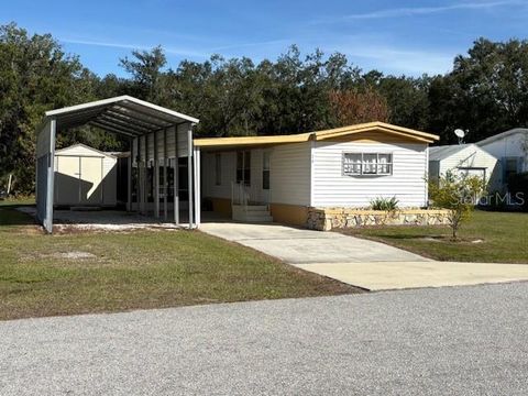 Photo of 76 Rosalie Oaks Boulevard, Lake Wales, FL 33898 (MLS # P4937619)