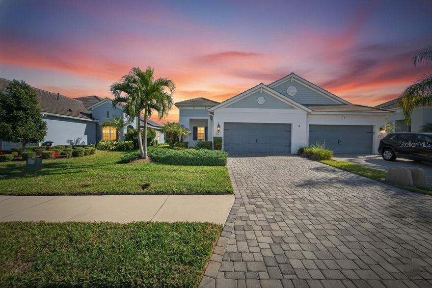 Experience effortless elegance in this exquisitely appointed villa located within the prestigious gated community of Indigo at Lakewood Ranch. This prestigious home has been thoughtfully reimagined with sophisticated updates in 2024–2025. This 3-bedroom, 2-bath residence with a dedicated den/study blends timeless design with modern luxury.
From the moment you enter, refined finishes and meticulous craftsmanship are on display. Luxury vinyl plank flooring and ceramic tile extend throughout the home, complemented by designer lighting and updated ceiling fans that elevate every space. The gourmet kitchen is a true showpiece, featuring sleek quartz countertops, a custom ship-lap–accented breakfast island, new premium refrigerator, and gas range/oven, ideal for both intimate gatherings and elegant entertaining.
The private owner’s retreat is a serene sanctuary, enhanced by spa-inspired quartz finishes, walk-in shower and dual walk-in closets complete with custom-built closet organizers. Every bedroom is thoughtfully designed for comfort and functionality.
Seamless indoor-outdoor living awaits on the west-facing, fully screened lanai with brick pavers, where dramatic pond views provide a nightly backdrop of natural beauty. Additional upscale and energy-efficient features include hurricane-impact windows and doors, a whole-house water filtration system, brick-paved patio and walkways, and a spacious 2-car garage.
Residents of Indigo enjoy a resort-caliber lifestyle, with access to an elegant clubhouse, state-of-the-art fitness center with activities director, 2 resort-style pools with spa, and pickleball, tennis, and bocce ball courts — all within one of Florida’s most celebrated master-planned communities.
This exceptional villa offers a rare opportunity to enjoy elevated living in Lakewood Ranch, where luxury, comfort, and lifestyle converge.
**This home is eligible for FULL USDA Financing**