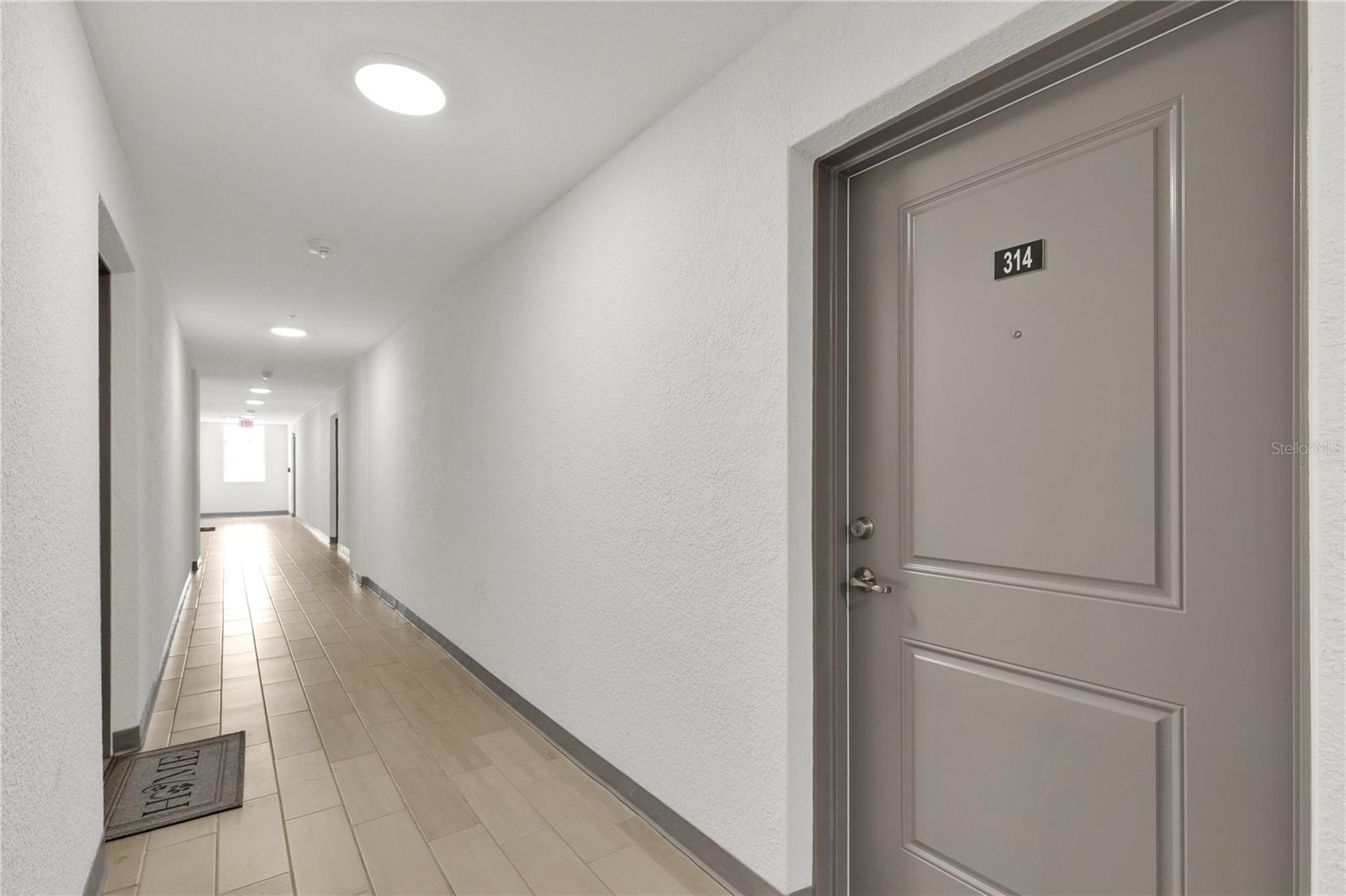 SANDLAKE STATION CONDOMINIUM 20240391386 UNIT 105 - Residential