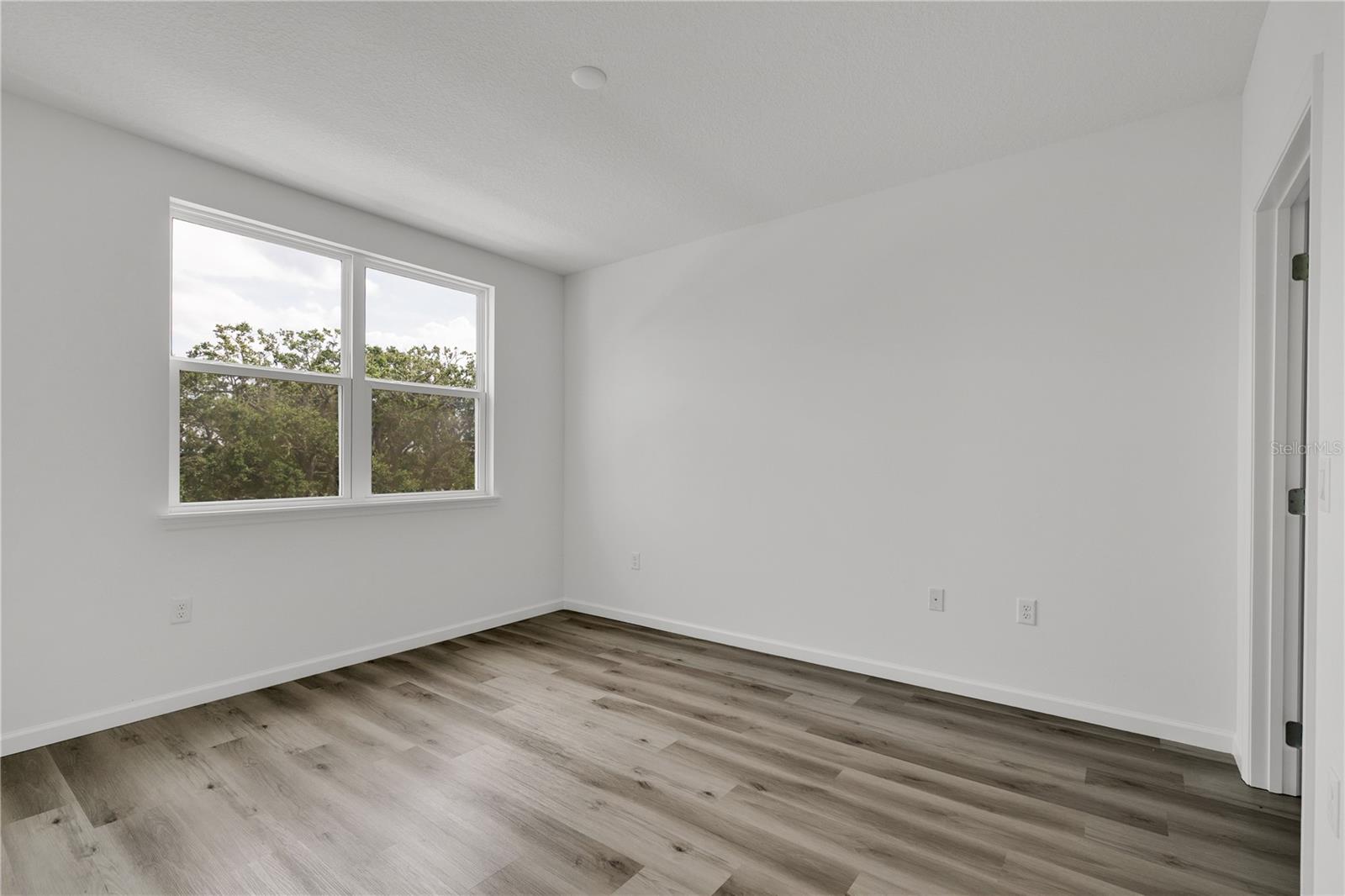 SANDLAKE STATION CONDOMINIUM 20240391386 UNIT 105 - Residential