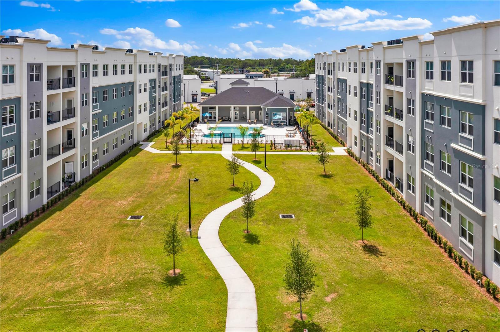 SANDLAKE STATION CONDOMINIUM 20240391386 UNIT 105 - Residential