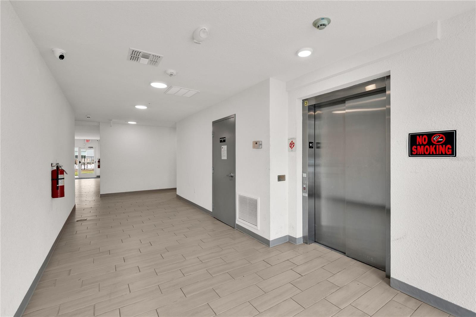 SANDLAKE STATION CONDOMINIUM 20240391386 UNIT 105 - Residential