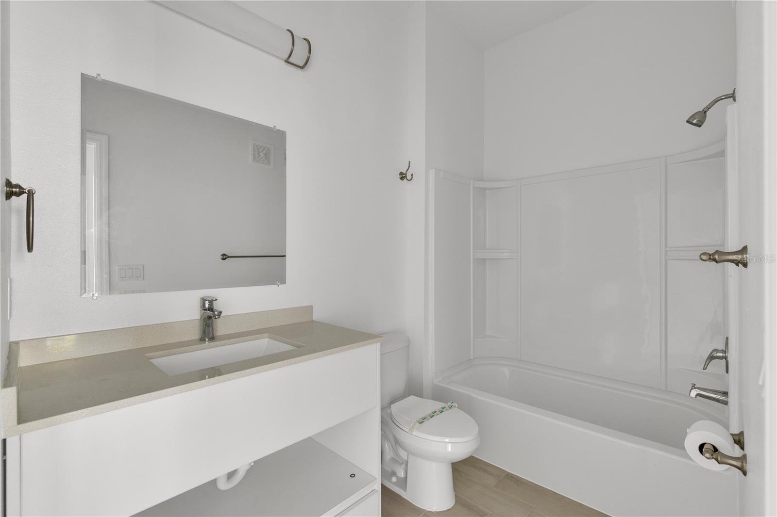 SANDLAKE STATION CONDOMINIUM 20240391386 UNIT 105 - Residential