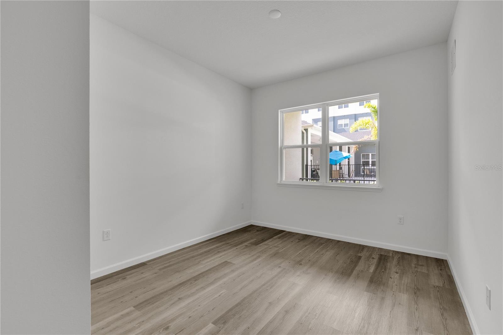 SANDLAKE STATION CONDOMINIUM 20240391386 UNIT 105 - Residential