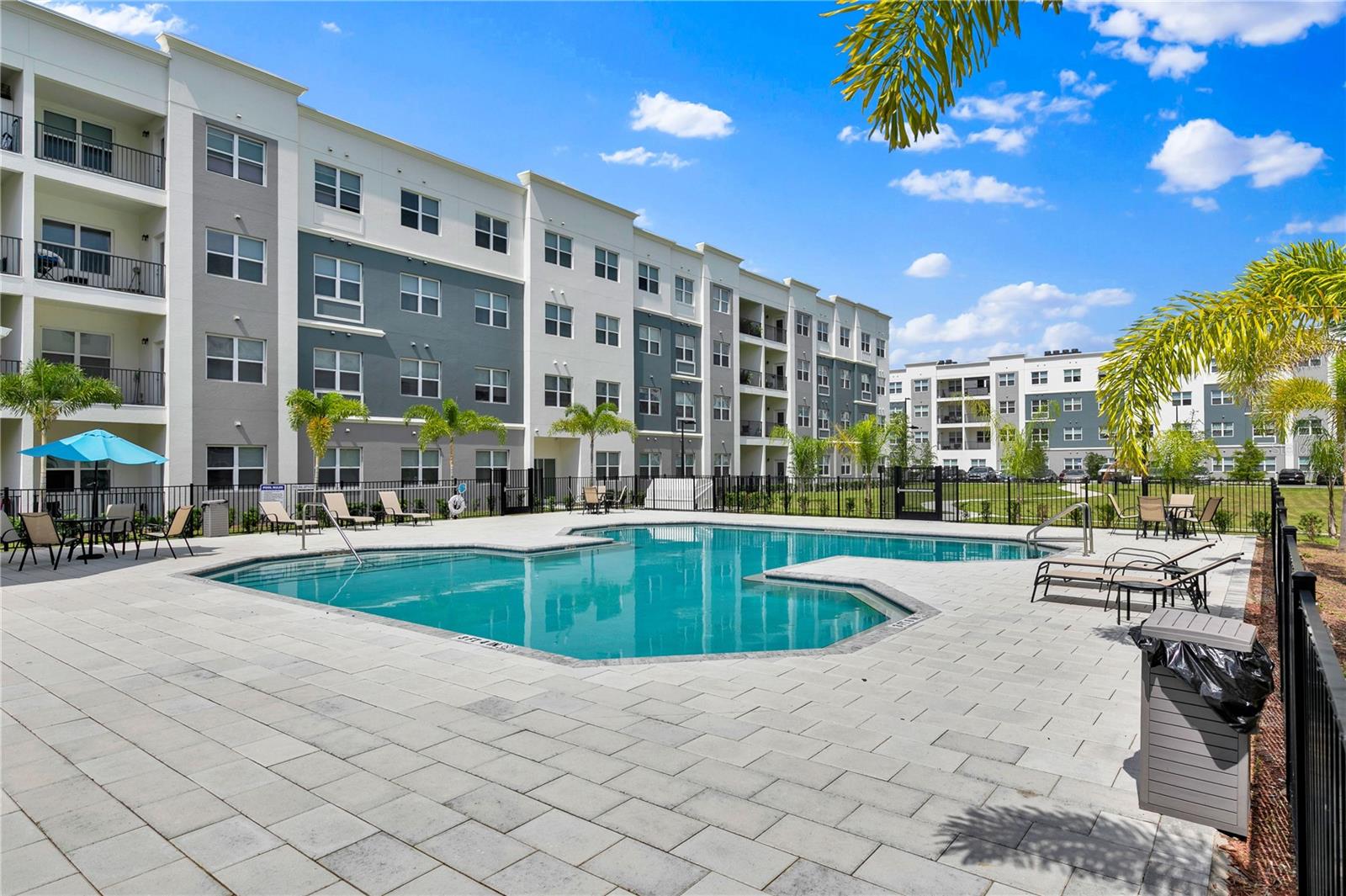 SANDLAKE STATION CONDOMINIUM 20240391386 UNIT 105 - Residential