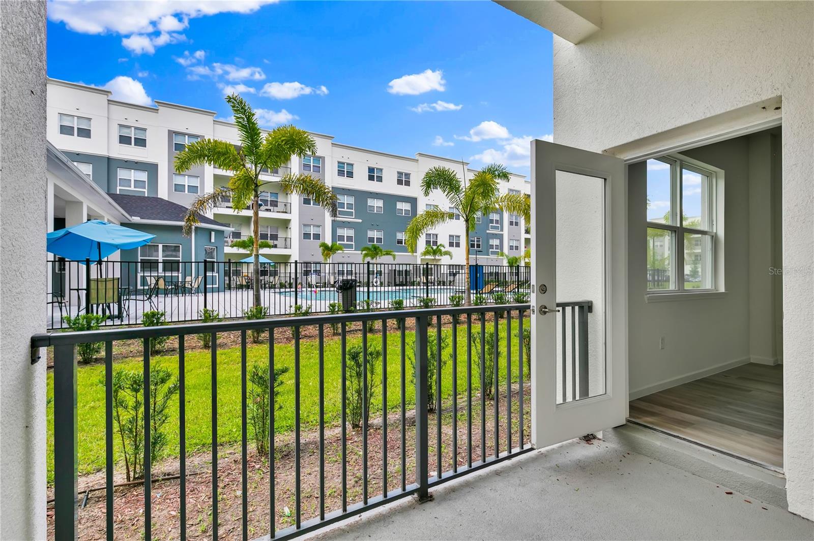 SANDLAKE STATION CONDOMINIUM 20240391386 UNIT 105 - Residential