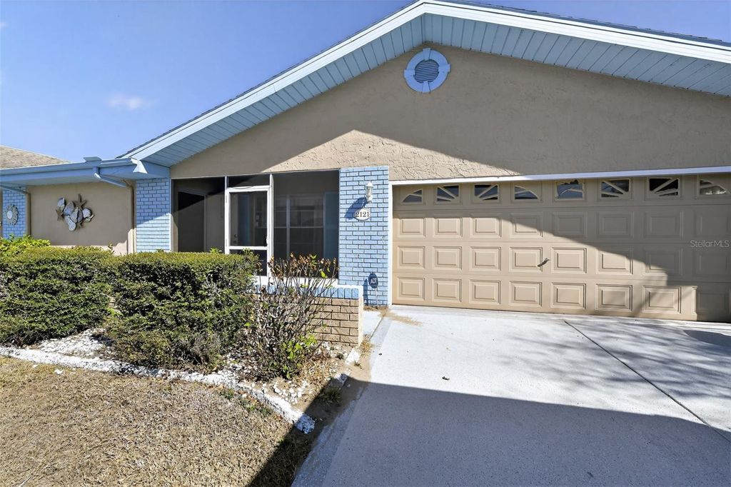 Photo of 2121 Meadowlark Lane, Sun City Center, FL 33573 (MLS # O6384998)