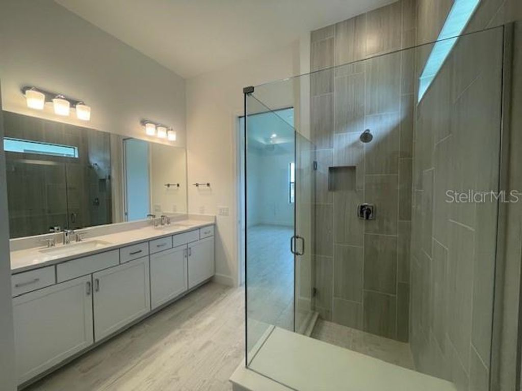 Photo of 19611 Indian Rock Place, Lakewood Ranch, FL 34211 (MLS # TB8436997)