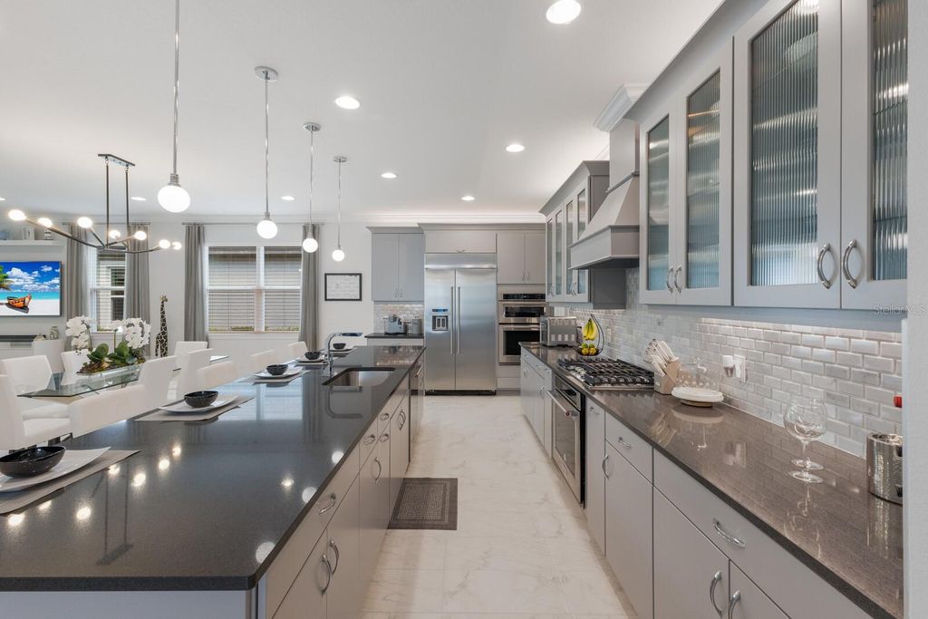 Photo of 5557 Long Shore Loop, Sarasota, FL 34238 (MLS # A4674783)