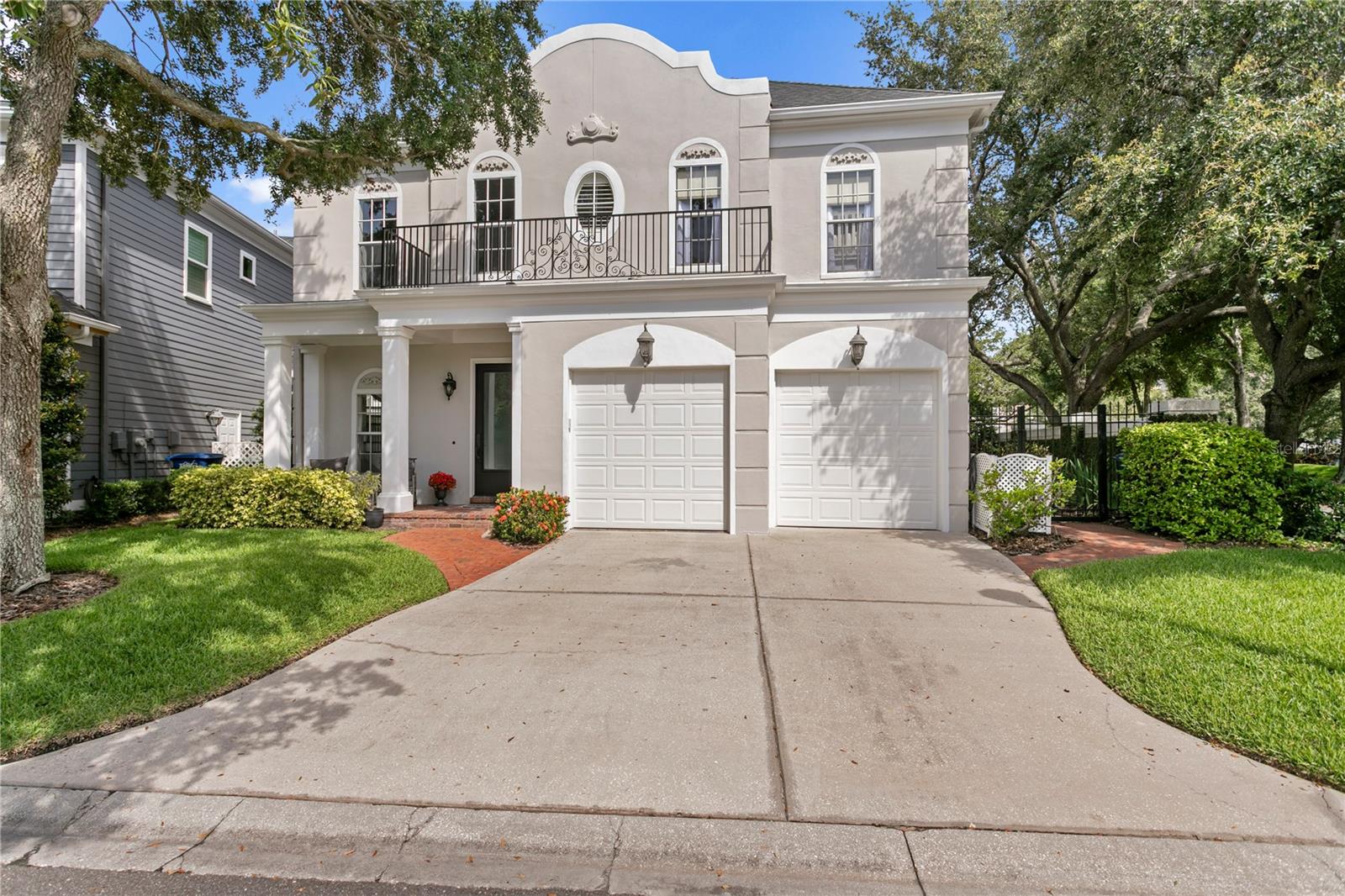Under contract-accepting backup offers. Welcome to refined living on Harbour Island—a beautifully renovated traditional-style residence nestled within one of Tampa’s most prestigious, private 24-hour gated communities. Perfectly positioned in the heart of the city, this home embodies elegance, comfort, and exceptional craftsmanship. From the moment you arrive, thoughtful design and meticulous attention to detail are evident throughout. The first floor offers seamless flow between formal and informal spaces, opening to an expansive outdoor living area with a gorgeous pool with ambient waterwall, outdoor kitchen and an oversized lot, that effortlessly connects the interior with the lush exterior. From the moment you arrive, gorgeous marble flooring greets you in the foyer and transitions to beautiful rich hardwood flooring. The chef’s kitchen is a true showpiece—featuring a spacious center island, generous storage with two separate pantry spaces, gas range and ovens, oversized refrigerator, and a custom bar area with icemaker and wine/beverage refrigerator—making entertaining both elevated and effortless. Upstairs you'll find four spacious, sunlit bedrooms. The primary suite overlooks Central Park’s beautifully landscaped grounds, and the marble-clad ensuite bath boasts dual vanities, a luxurious soaking tub, and an oversized walk-in shower. Not 1 but 2 custom finished closets complete the tranquil retreat. Recent upgrades include freshly painted exterior (2025), new roof (2020), air conditioning replacement (2020 & 2023), tankless water heater (2025), just to name a few. Harbour Island offers a rare blend of serenity and access. Enjoy walkability to Tampa’s Riverwalk, Amalie Arena, Sparkman Wharf, and Water Street’s renowned dining. With swift access to I-275, the Selmon Expressway, and Tampa International Airport, every destination is within easy reach. Don't miss this opportunity to embrace the best of Tampa's quasi-urban lifestyle in a home that truly has it all.