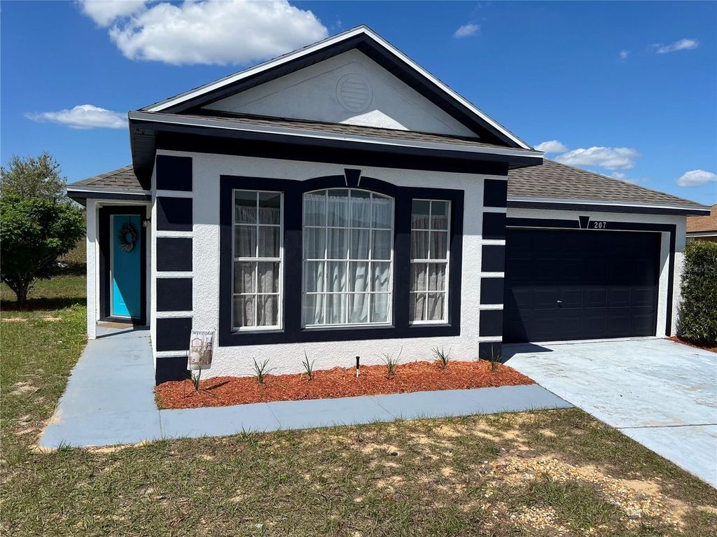 Photo of 207 High Ridge Drive, Davenport, FL 33837 (MLS # O6382429)