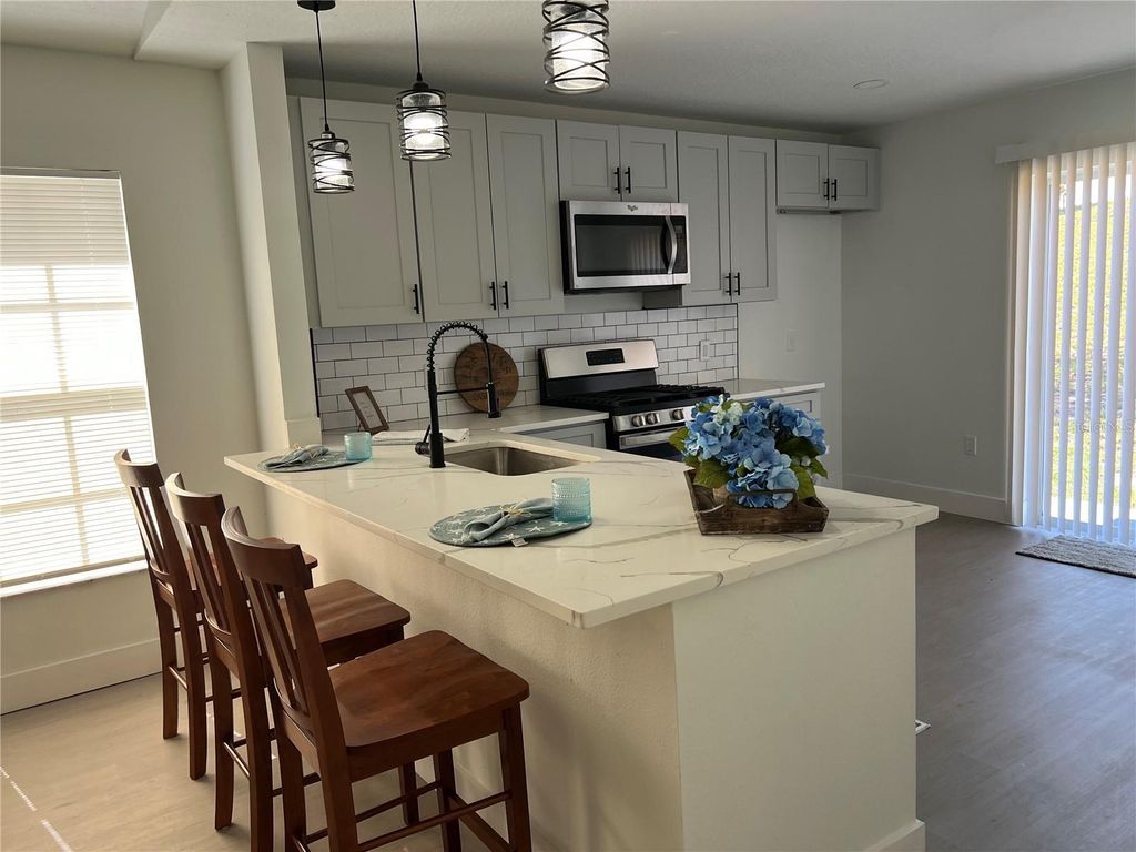 Photo of 207 High Ridge Drive, Davenport, FL 33837 (MLS # O6382429)