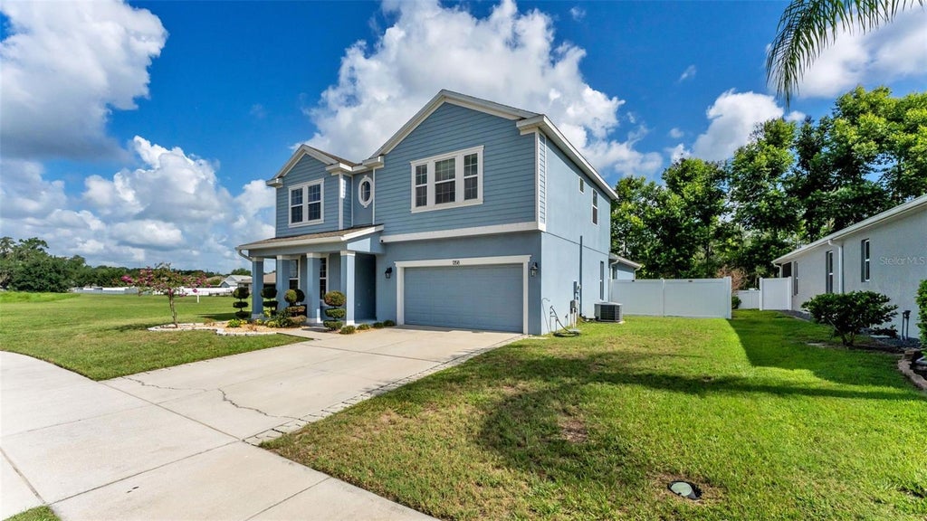 Photo of 1358 Windward Oaks Loop, Auburndale, FL 33823 (MLS # P4939144)